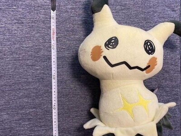 Embrace Mimikyu's Mystery: Cuddly Toy Edition